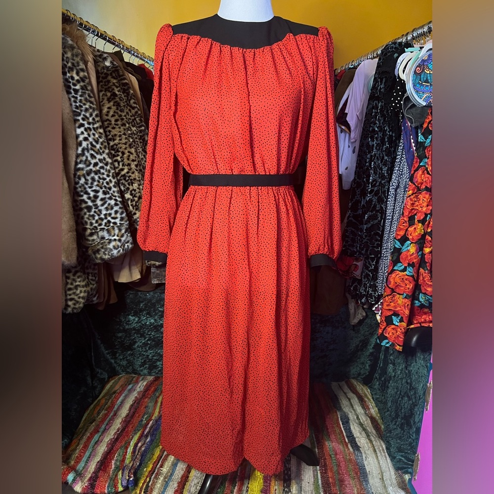 Vintage red dress with black polkadot shapes